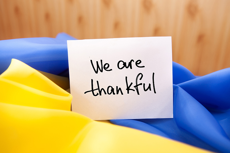We are thankful! written on the a notecard