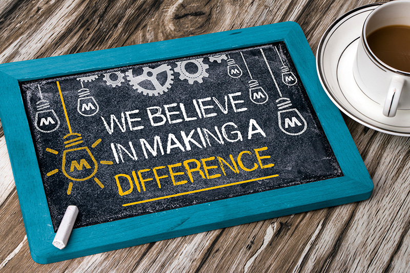 Chalkboard saying We Believe in Making A Difference
